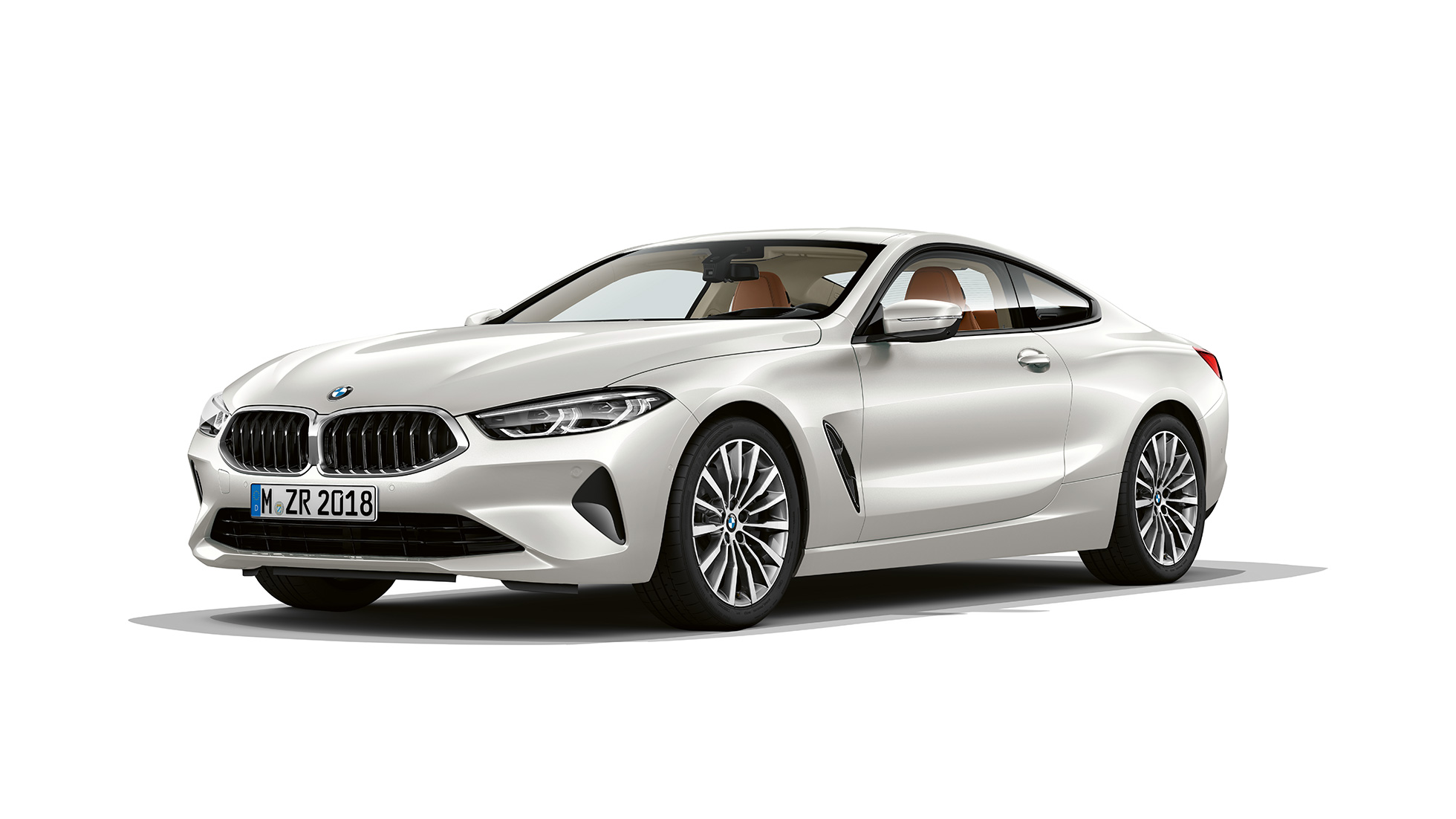 BMW 8 Series Coupé, Mineral White metallic, three-quarter front view.