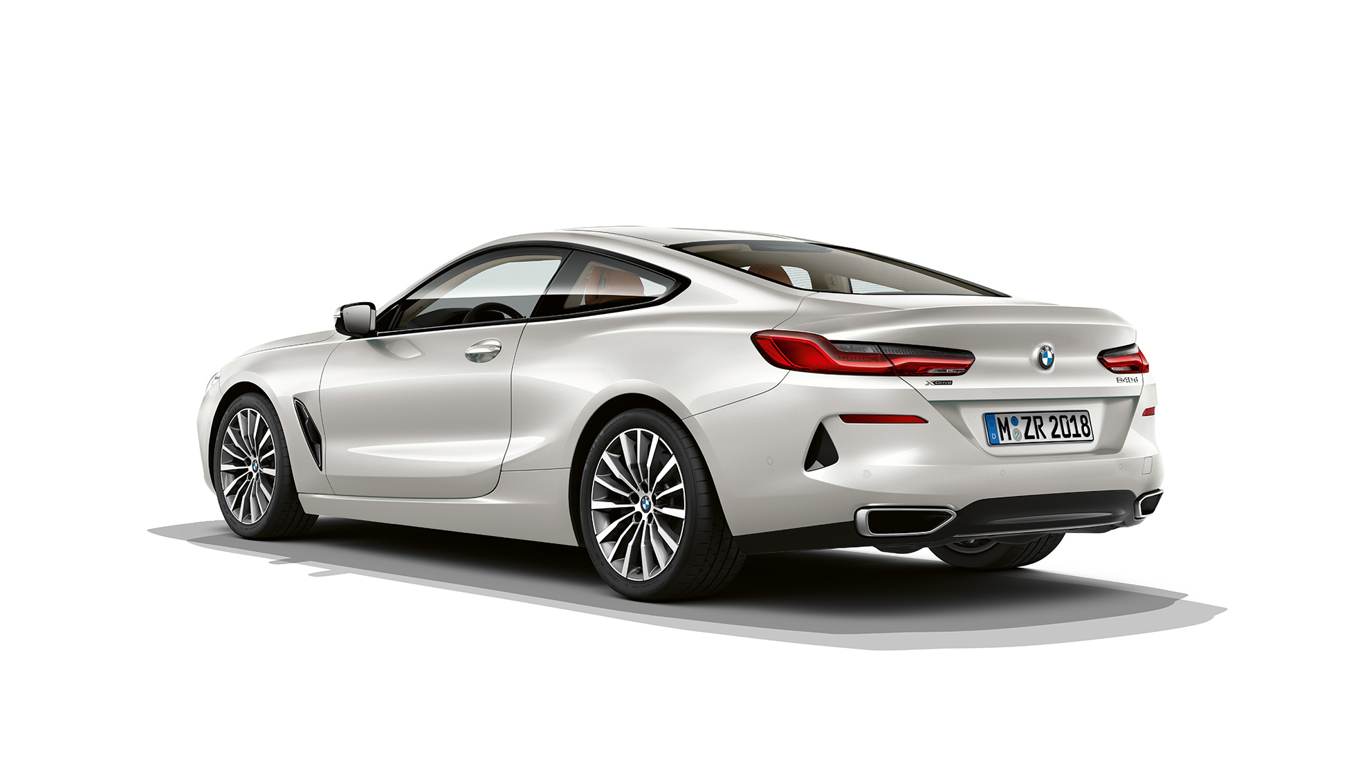 BMW 8 Series Coupé, Mineral White metallic, three-quarter back view.