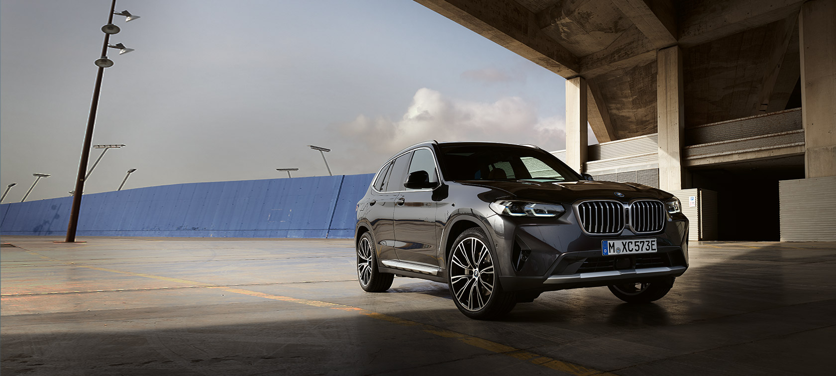 BMW X3 G01 three-quarter rear view driving 2021